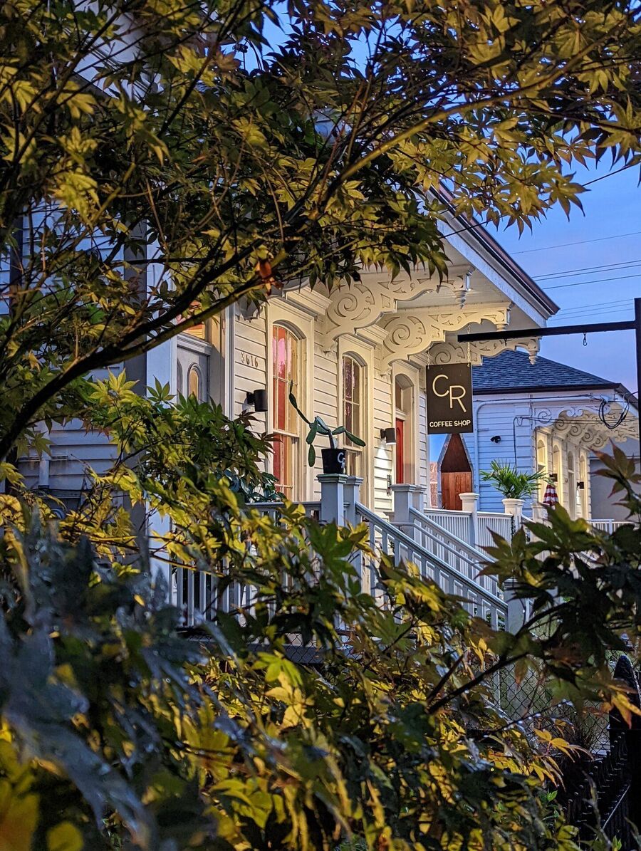 CR Coffee on Magazine Street, New Orleans, at dusk.